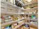 Pantry featuring wire shelving, clear storage containers, woven baskets, and a variety of items at 2936 W Knights Ave # A, Tampa, FL 33611
