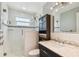 Updated bathroom with new fixtures, shower, and a dark wood cabinet at 2960 59Th S St # 614, Gulfport, FL 33707