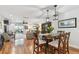 Elegant dining area with hardwood floors, stylish furniture, and plenty of natural light at 2960 59Th S St # 614, Gulfport, FL 33707