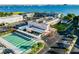 Aerial view of community recreation center overlooking boat docks and waterfront in Florida neighborhood at 2960 59Th S St # 614, Gulfport, FL 33707