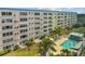 Exterior view showcasing the pool, lounge area, and building facade at 2960 59Th S St # 614, Gulfport, FL 33707