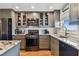 Modern kitchen with stainless steel appliances, granite countertops, and ample cabinet space at 2960 59Th S St # 614, Gulfport, FL 33707