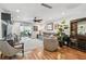 Spacious living room with hardwood floors, comfortable seating, and lots of natural light at 2960 59Th S St # 614, Gulfport, FL 33707