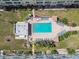 Aerial view of the rectangular pool with lounge chairs surrounding the pool deck and landscaping at 2960 59Th S St # 614, Gulfport, FL 33707