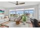 Inviting sunroom with large windows offering beautiful neighborhood views at 2960 59Th S St # 614, Gulfport, FL 33707