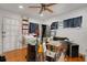 Bedroom with a ceiling fan, and a cluttered floor at 3008 Jackson N St, St Petersburg, FL 33704