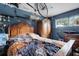 Main bedroom showcasing a wooden bed frame and dark blue accents at 3008 Jackson N St, St Petersburg, FL 33704