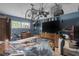 Chaotic primary bedroom with a bike and various personal belongings at 3008 Jackson N St, St Petersburg, FL 33704