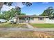 Inviting home with a brick pathway leading to the front entrance at 3008 Jackson N St, St Petersburg, FL 33704