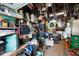 Cluttered garage filled with tools, bikes, and storage items at 3008 Jackson N St, St Petersburg, FL 33704