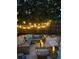 Cozy backyard patio with string lights, stylish wicker furniture, and a relaxing outdoor ambiance at 3305 10Th N Ave, St Petersburg, FL 33713