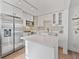 Bright kitchen featuring white cabinets, stainless steel appliances, and a center island at 3305 10Th N Ave, St Petersburg, FL 33713
