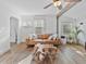 Bright living room with leather sofa, wood accents, and ample natural light at 3305 10Th N Ave, St Petersburg, FL 33713