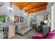 A versatile living room with wooden beamed ceilings that can be used as an office or den at 345 8Th Ne Ave, St Petersburg, FL 33701