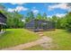 Spacious backyard with screened pool area at 35031 Shale St, Webster, FL 33597