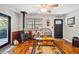 The bright living room includes a wood-burning stove, and cozy furnishings at 35031 Shale St, Webster, FL 33597