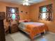 Comfortable bedroom features neutral walls, tile floor and a ceiling fan at 3827 15Th N Ave, St Petersburg, FL 33713