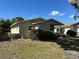 Exterior view of a cozy single-story home featuring a covered porch and tidy landscaping at 3827 15Th N Ave, St Petersburg, FL 33713