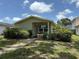 Exterior showcasing inviting landscaping and a stone walkway to the front door at 3827 15Th N Ave, St Petersburg, FL 33713