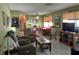 Comfortable living room and dining area, featuring tile floors and ample seating at 3827 15Th N Ave, St Petersburg, FL 33713