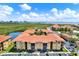Beautiful community featuring lush landscaping, lake, and stunning views from multiple units at 4333 Bayside Village Dr # 110, Tampa, FL 33615