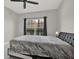 Cozy bedroom with a large window and a comfortable bed, creating a relaxing retreat at 4333 Bayside Village Dr # 110, Tampa, FL 33615