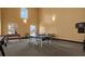 Spacious game room featuring a ping pong table, foosball, and a dart board at 4333 Bayside Village Dr # 110, Tampa, FL 33615