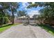 Wide shot of a yard featuring a paver drive at 4518 W Woodmere Rd, Tampa, FL 33609