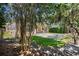 Exterior of home featuring a patio and lawn at 4518 W Woodmere Rd, Tampa, FL 33609
