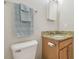 Bathroom featuring a granite countertop, neutral paint, and new fixtures at 4528 Winding River Way, Land O Lakes, FL 34639