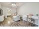 This bonus room features neutral paint, ceiling fan, and desk at 4528 Winding River Way, Land O Lakes, FL 34639