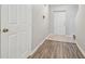Entryway with modern floors and neutral paint at 4528 Winding River Way, Land O Lakes, FL 34639