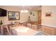 Dining area with pendant lighting and comfortable seating at 4744 Azalea Dr # 203B, New Port Richey, FL 34652