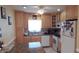 Functional kitchen featuring stainless steel appliances and tile backsplash and natural light at 4744 Azalea Dr # 203B, New Port Richey, FL 34652