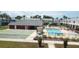 Community pool, shuffleboard court, lounge chairs and meticulously maintained grounds at 4744 Azalea Dr # 203B, New Port Richey, FL 34652