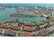 Waterfront community with serene views, featuring condos, pools, and boat docks for residents at 511 Sandy Hook Rd, Treasure Island, FL 33706