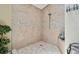 The bathroom features a tiled walk-in shower and a seating area at 511 Sandy Hook Rd, Treasure Island, FL 33706
