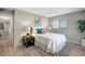 Stylish bedroom with a modern bed, vibrant pillows, and sleek side table at 5582 Baywater Dr, Tampa, FL 33615