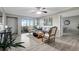 Living room filled with light, featuring a view of the outdoor greenery at 5582 Baywater Dr, Tampa, FL 33615