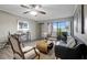 Spacious living area with natural light, hardwood floors, and sliding doors at 5582 Baywater Dr, Tampa, FL 33615