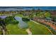 Scenic aerial view of golf course community with water features and lush green fairways at 6151 Bahia Del Mar Blvd # 126, St Petersburg, FL 33715