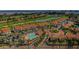 Extensive aerial of residences near a golf course, pool, and landscaped community at 6151 Bahia Del Mar Blvd # 126, St Petersburg, FL 33715