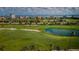 Scenic view of a golf course and condo community with water views at 6151 Bahia Del Mar Blvd # 126, St Petersburg, FL 33715
