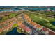 Community aerial view featuring residential units, golf course, and waterway views at 6151 Bahia Del Mar Blvd # 126, St Petersburg, FL 33715