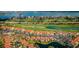Aerial view of a condo community situated next to a pristine golf course and waterfront at 6151 Bahia Del Mar Blvd # 126, St Petersburg, FL 33715