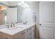 Bathroom with double vanity, modern fixtures, and white shaker cabinets offers plenty of storage at 6151 Bahia Del Mar Blvd # 126, St Petersburg, FL 33715