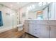 Beautiful bathroom with double vanity, shower, and contemporary fixtures at 6151 Bahia Del Mar Blvd # 126, St Petersburg, FL 33715