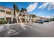 Exterior view showing building, parking, and landscaping with a beautiful blue sky at 6151 Bahia Del Mar Blvd # 126, St Petersburg, FL 33715