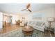 This well-lit living room showcases an open floor plan and a cozy seating area at 6151 Bahia Del Mar Blvd # 126, St Petersburg, FL 33715