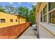 Backyard space featuring privacy fence, exterior storage, and an outdoor grill at 670 Wooddell Dr, Safety Harbor, FL 34695